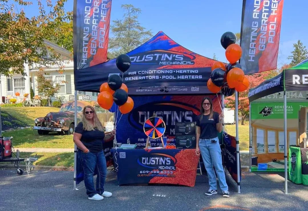 Dustin's Mechanical team at a New Egypt, NJ community event with their tent and balloons