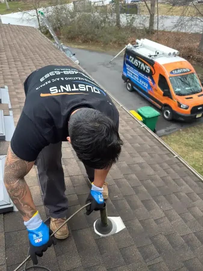 technician working on drain