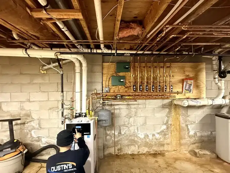 Technician servicing boiler in New Egypt, NJ
