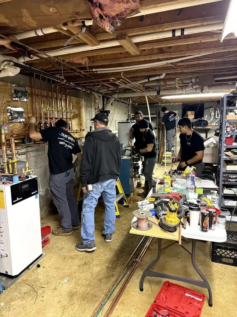 Technicians working on HVAC system in New Egypt, NJ