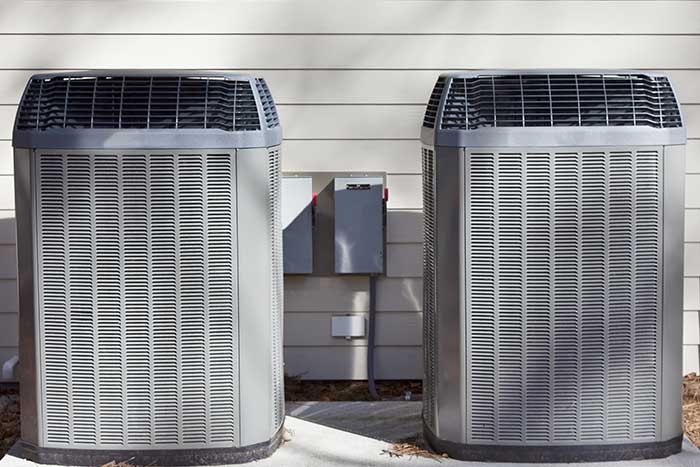 Two high-efficiency air conditioning units installed side by side