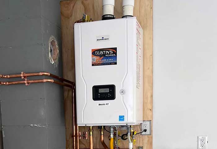 Tankless water heater with copper and gas line connections