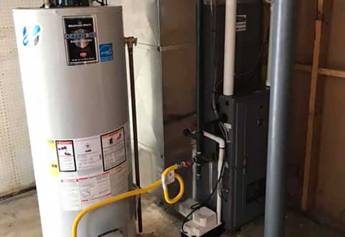 Water heater connected to HVAC system with yellow gas line